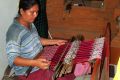 Weaving with the backstrap loom.